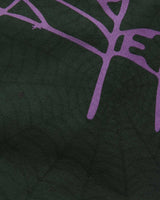 Sp5der Heavy Web Sweatpants dark green, close-up of the purple web print on the fabric