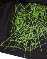 Sp5der Mesh Double Layer Shorts onyx, close-up of the elastic waistband and green sp5der wordmark on black mesh