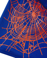 Sp5der Mesh Double Layer Shorts blue, close-up of the orange spiderweb print on the blue mesh liner