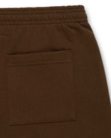 Sp5der OG Web Rhinestone Sweatpants brown, close-up of the back patch pocket and elasticated waistband