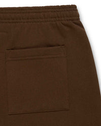 Sp5der OG Web Rhinestone Sweatpants brown, close-up of the back patch pocket and elasticated waistband