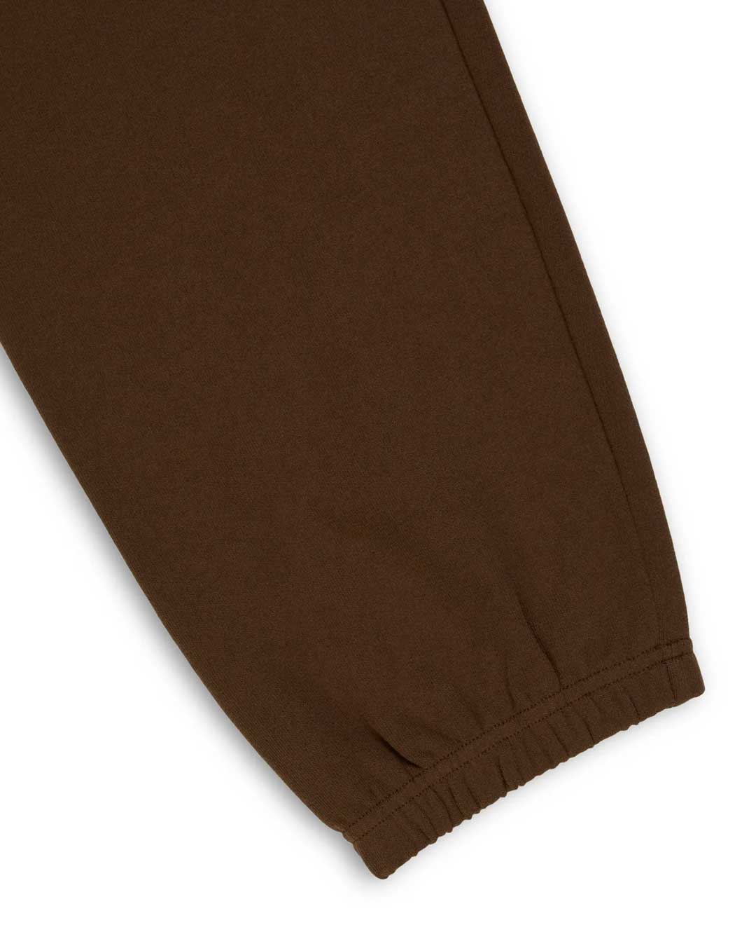 Sp5der OG Web Rhinestone Sweatpants brown, close-up of the elasticated ankle cuff