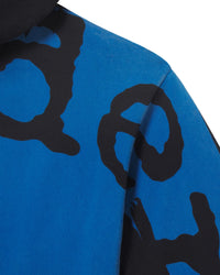 Sp5der Overprint Zip Up Hoodie onyx, close-up of the black Sp5der print on the blue back panel
