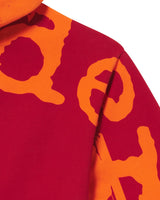 Sp5der Overprint Zip Up Hoodie tangerine orange, close-up of the oversized back lettering at the shoulder