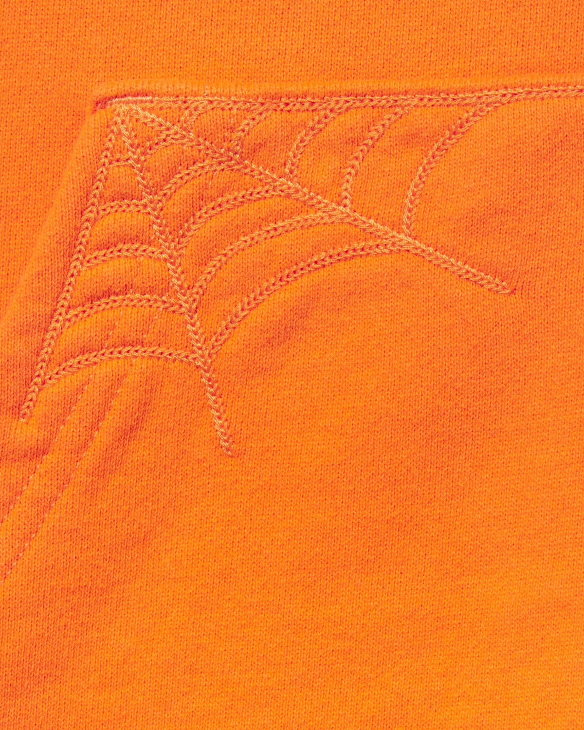 Sp5der Overprint Zip Up Hoodie tangerine orange, close-up of the tonal web stitching on the front