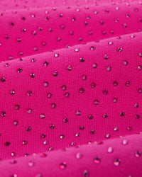 Sp5der Rhinestone OG Logo V2 Wide Leg Sweatpants pink, angled close-up of the rhinestones catching the light across the fabric