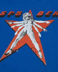 Sp5der Star Girl Tee blue, close-up of the red star, halftone figure and SP5DER wordmark