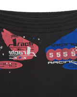 Sp5der Tire Tech Sweatshorts black, close-up of the ribbed waistband and racing badge print