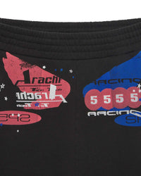 Sp5der Tire Tech Sweatshorts black, close-up of the ribbed waistband and racing badge print