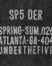 Sp5der Underthefive Sweater black, close-up of the knitted SP5 DER, Spring-Sum.026 and Atlanta-GA-404 text