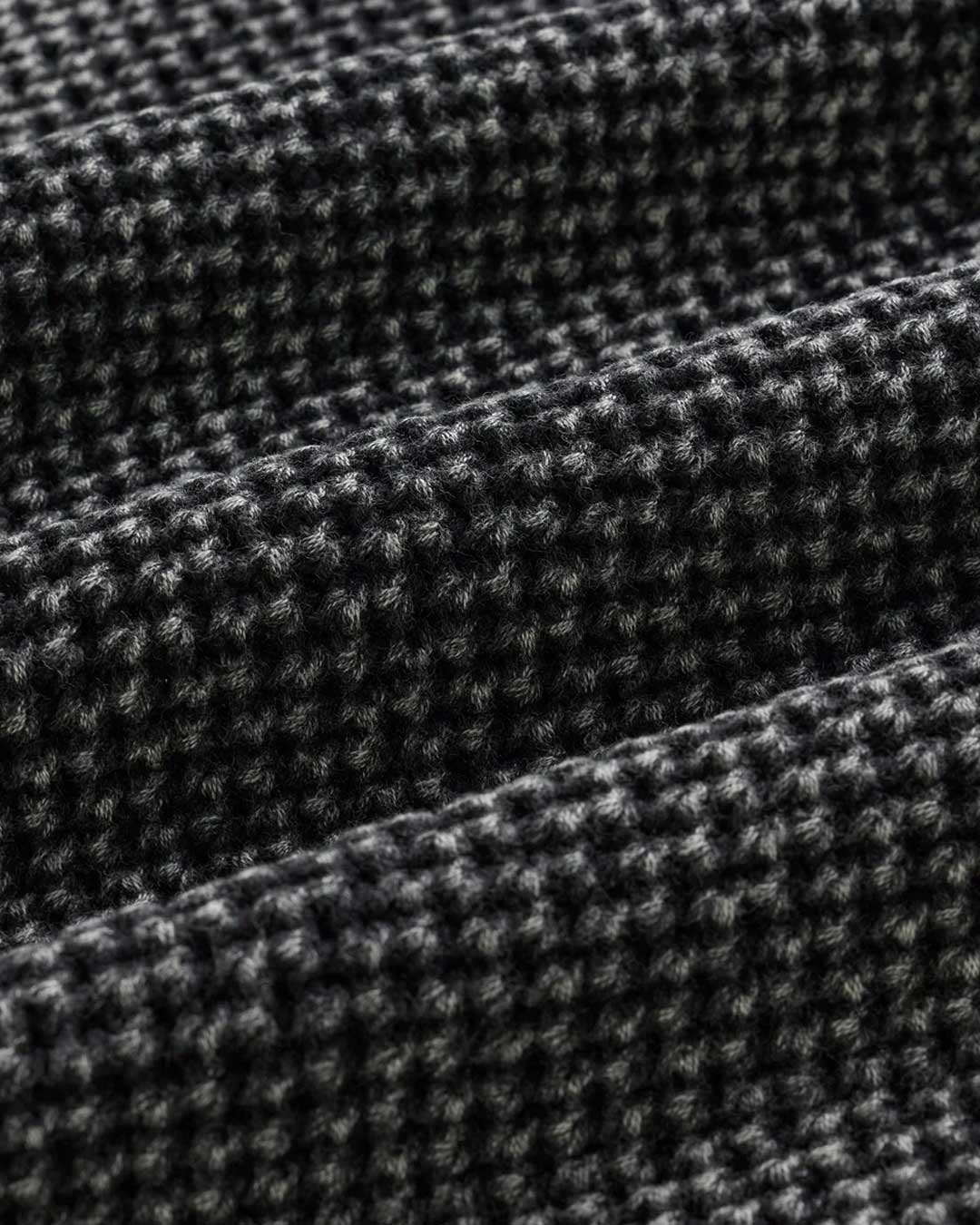 Sp5der Underthefive Sweater black, close-up of the washed waffle-knit texture