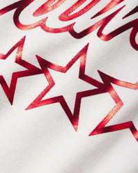 Sp5der Venimeux Tee glacier white, close-up of the metallic red stars