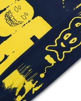 Close-up of a blue and yellow patterned fabric with abstract designs.