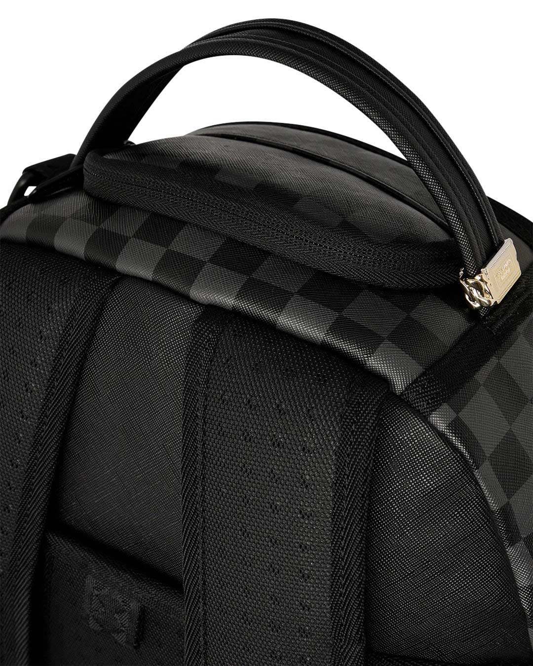 Sprayground Bag Done Wrong Backpack, close-up of the top carry handle