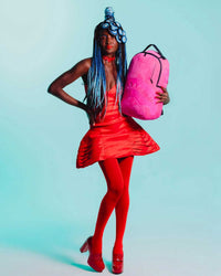 Sprayground Candy-Raver Shark Backpack, worn on a model