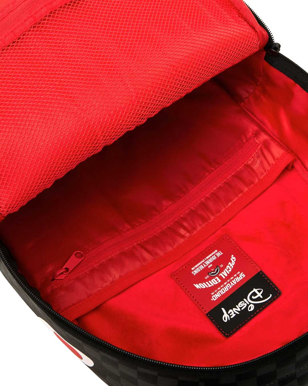 Sprayground Disney Goofy Being Goofy Backpack, detail of the red shark mouth panel