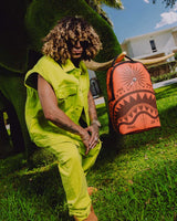 Sprayground Jon Z Tattoos Backpack red, worn on the shoulders, model view
