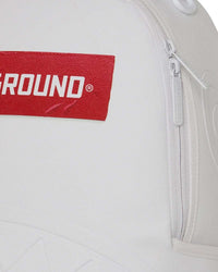 Sprayground Money Trick Backpack White, close-up of the embossed shark teeth