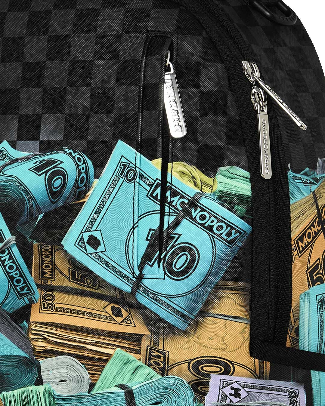 Sprayground Monopoly Money Stacks Backpack, close-up of the zipper pull