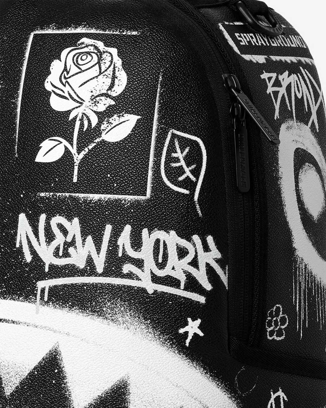 Sprayground NYBG Bronx Vibes Backpack, close-up of the graffiti print detail