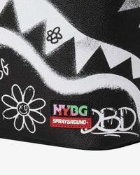 Sprayground NYBG Bronx Vibes Backpack, close-up of the NYBG and Sprayground logo patch