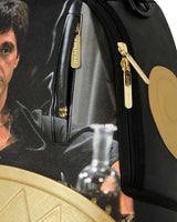 Sprayground Scarface My Place Backpack, close-up of the gold embossed shark teeth