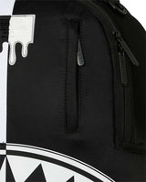 Sprayground Shark Central 2.0 Beyond Time Backpack, close-up of the drip logo patch