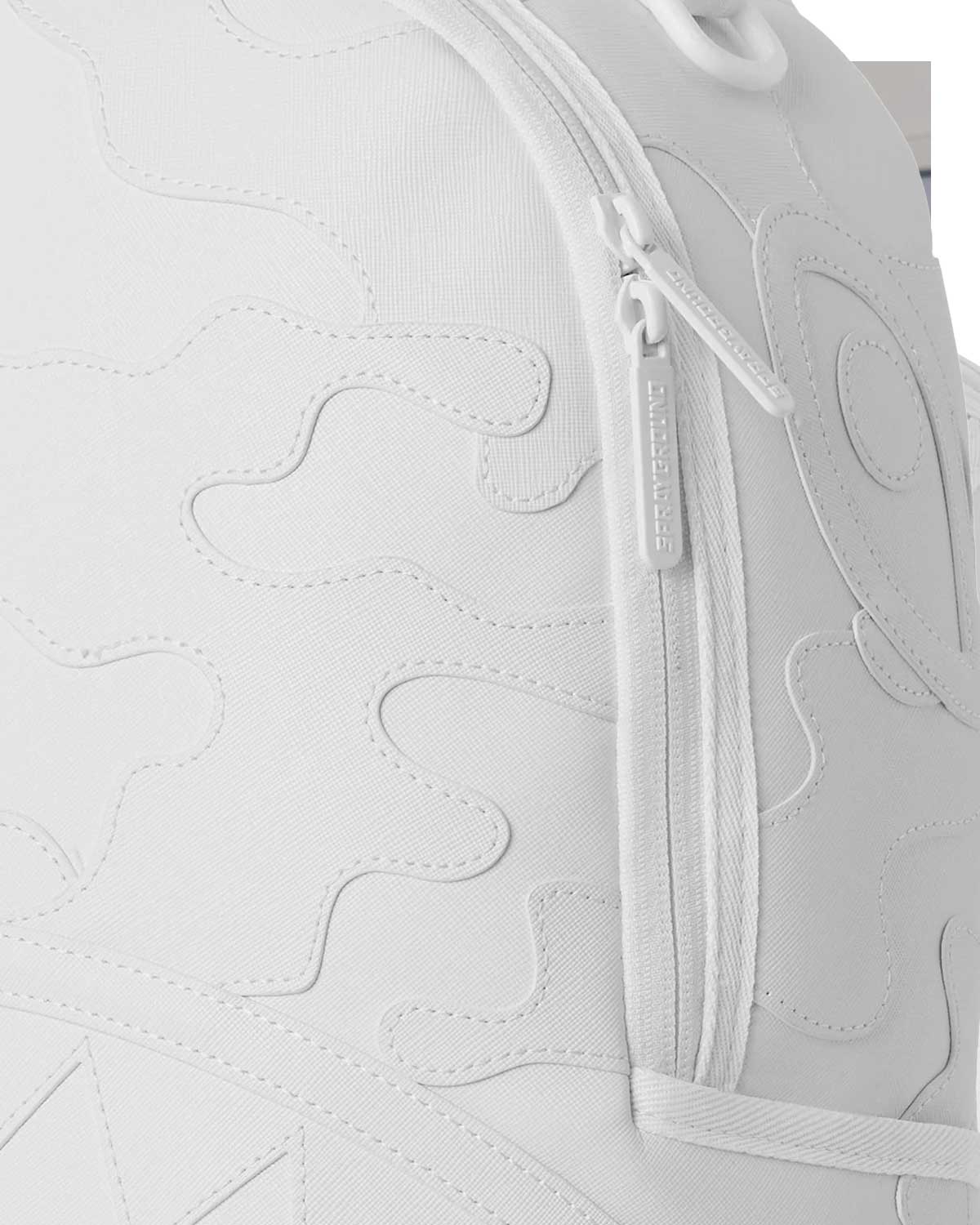Sprayground Shark Central Camo Cut Shark White Backpack, close-up detail of the camo-cut stitching