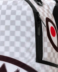 Sprayground Spectral Shadow Backpack, close-up of the checkerboard texture and shark teeth