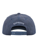 Supreme Garage 6 Panel Hat navy, back view showing arched SUPREME embroidery and snapback strap