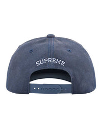 Supreme Garage 6 Panel Hat navy, back view showing arched SUPREME embroidery and snapback strap