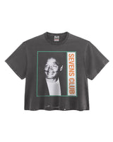 Triple Sevens Free OJ Tee black, washed tee with a framed greyscale portrait and vertical orange Sevens Club lettering, front view