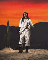Triple Sevens Moto Sweatpants grey worn by a model against a desert sunset backdrop