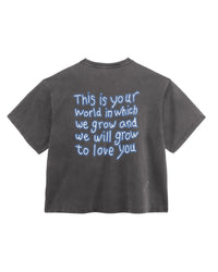 Triple Sevens Tears Tee black, back view with a handwritten blue text block print