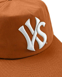 Vale Forever Aubrey Snapper brown, close-up of the white VS monogram embroidery