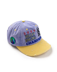 Vale Forever Blue Day Cap blue, angled side view of the crown and yellow brim