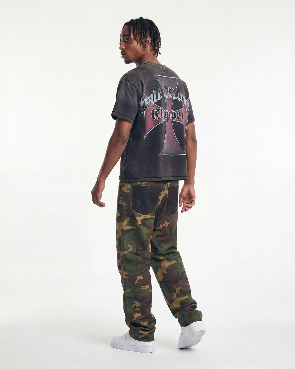 Model wearing Boredom Kills Double Pants camo, back view showing denim yoke and camo legs