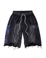 Vale Forever Football Kountry Swort black, washed sweat shorts with a purple paisley leg panel and frayed hems, front view