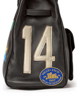 Vale Forever Lucky Charms Bag brown, close-up of the cream 14 applique and blue Valley State 1997 patch on the side panel