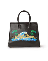 Vale Forever Lucky Charms Bag brown, back view showing hand-painted Valley Dreams script with palm trees and a wave