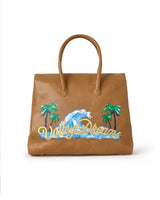 Vale Forever Lucky Charms Bag tan, hand-painted Valley Dreams script with palm trees and a wave across the back, back view
