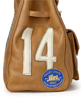 Vale Forever Lucky Charms Bag tan, close-up of the white appliqué 14 and blue Valley State 1997 embroidered patch