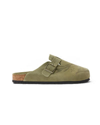 Vale Forever Matcha Clogs green, side profile showing the buckle strap, contoured footbed and black outsole