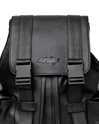 Vale Forever Tactician Backpack black, close-up of the embossed Vale script and buckle straps