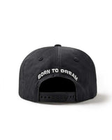 Vale Forever VSU Snapper black, back view with Born to Dream embroidery above the snapback strap