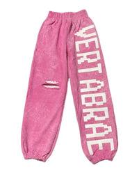 Vertabrae C-2 Distressed Sweatpants washed pink, fleece sweatpants with the white pixel VERTABRAE wordmark down one leg and a distressed slash at the knee, front view