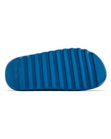 Yeezy YS-01 Slides blue, outsole view showing the ridged tread
