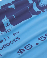 Sp5der Commerce Tee dusty blue, close-up of the $5.55 print detail