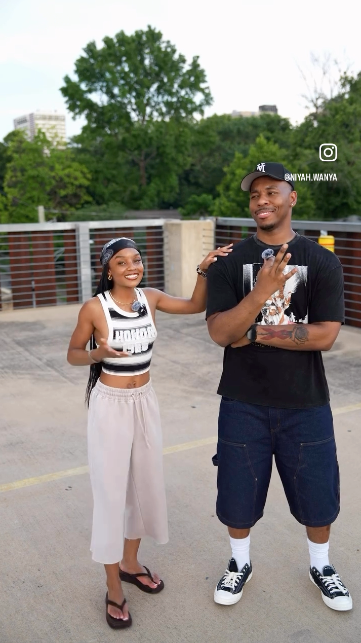 Couple wearing restock ar streetwear clothing