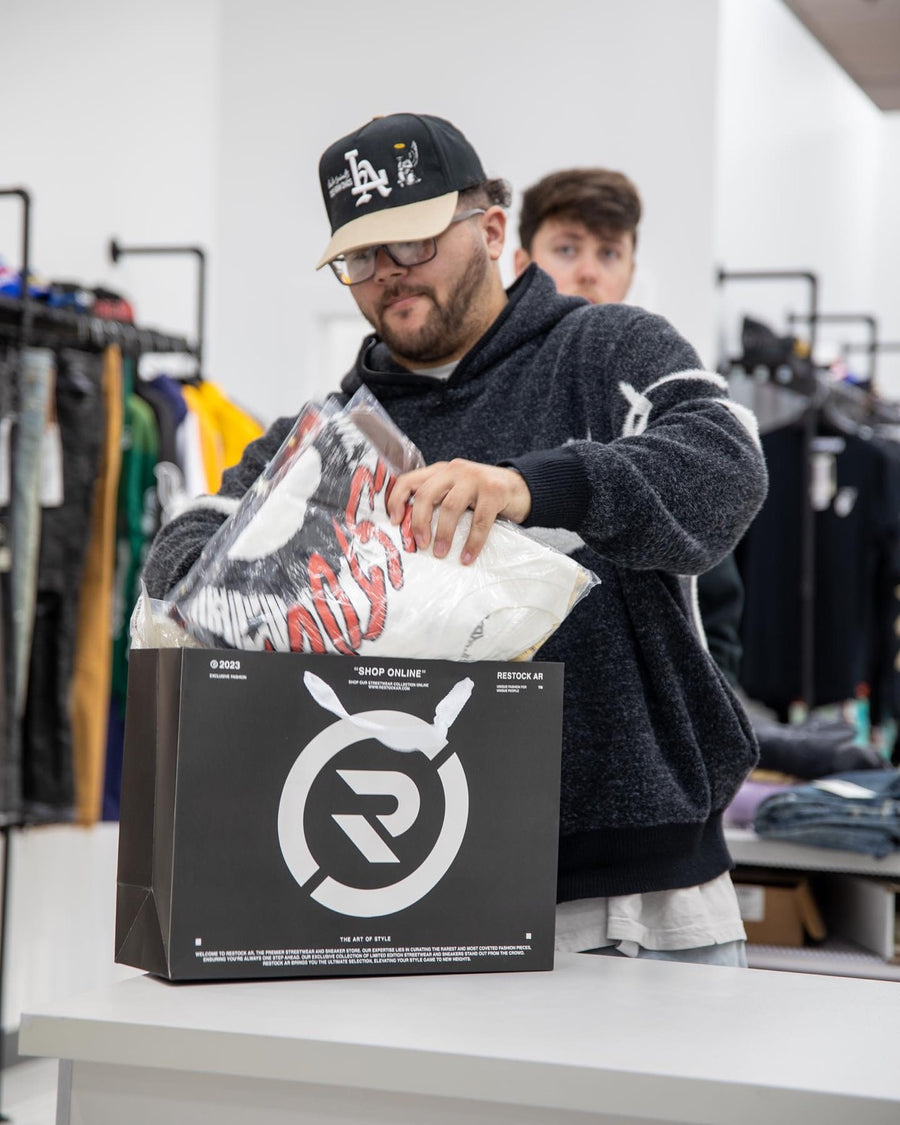 Customer shopping inside the Restock AR store in Rogers, Arkansas